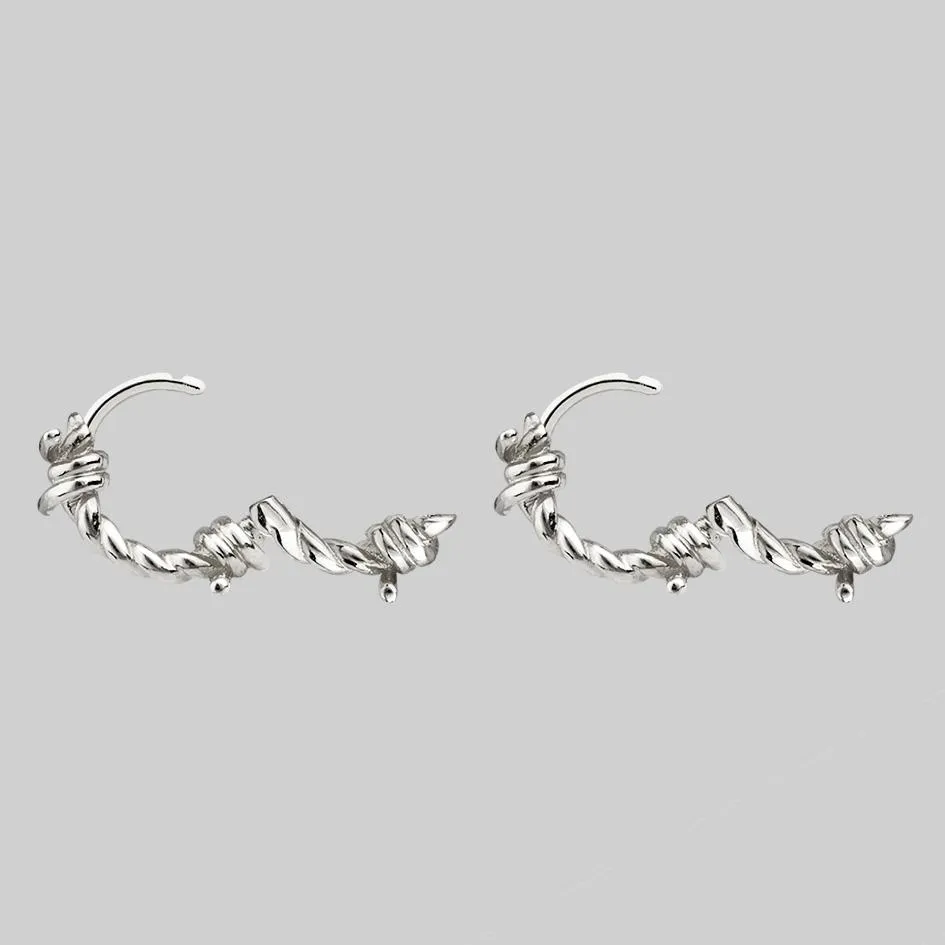 SURVIVAL. Symbolic Barbed Wire Clicker Hoop Earrings - Silver